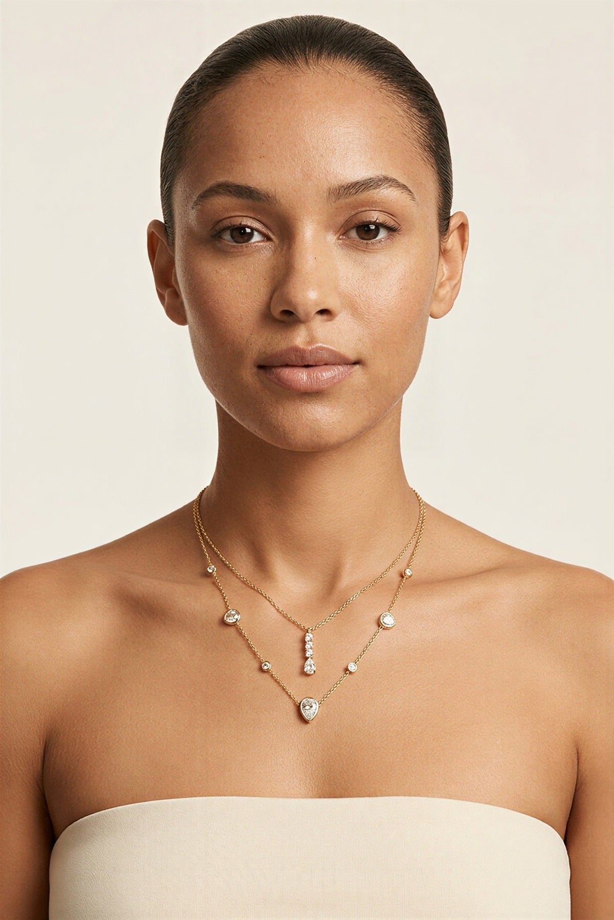 Delphine Waterproof Layered Teardrop CZ Necklace worn by model – Akalia waterproof jewelry