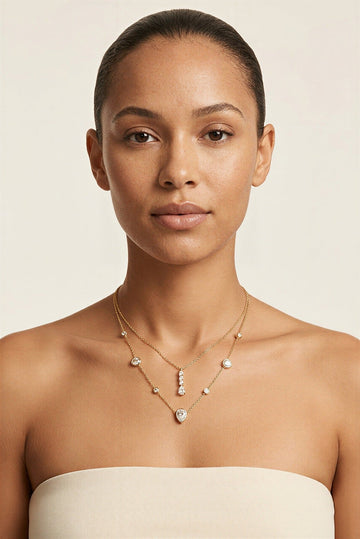 Delphine Waterproof Layered Teardrop CZ Necklace worn by model – Akalia waterproof jewelry