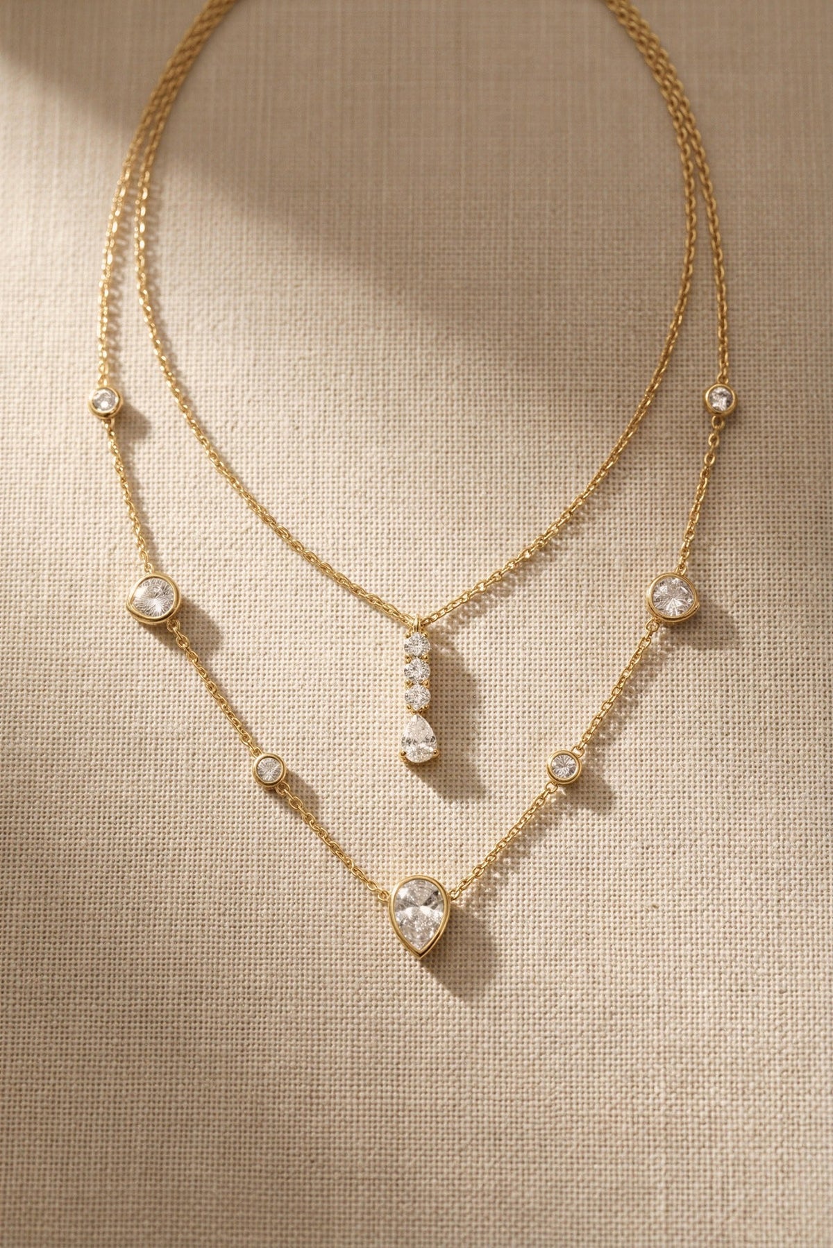 Delphine Waterproof Layered Teardrop CZ Necklace close-up detail – 18K gold PVD over stainless steel