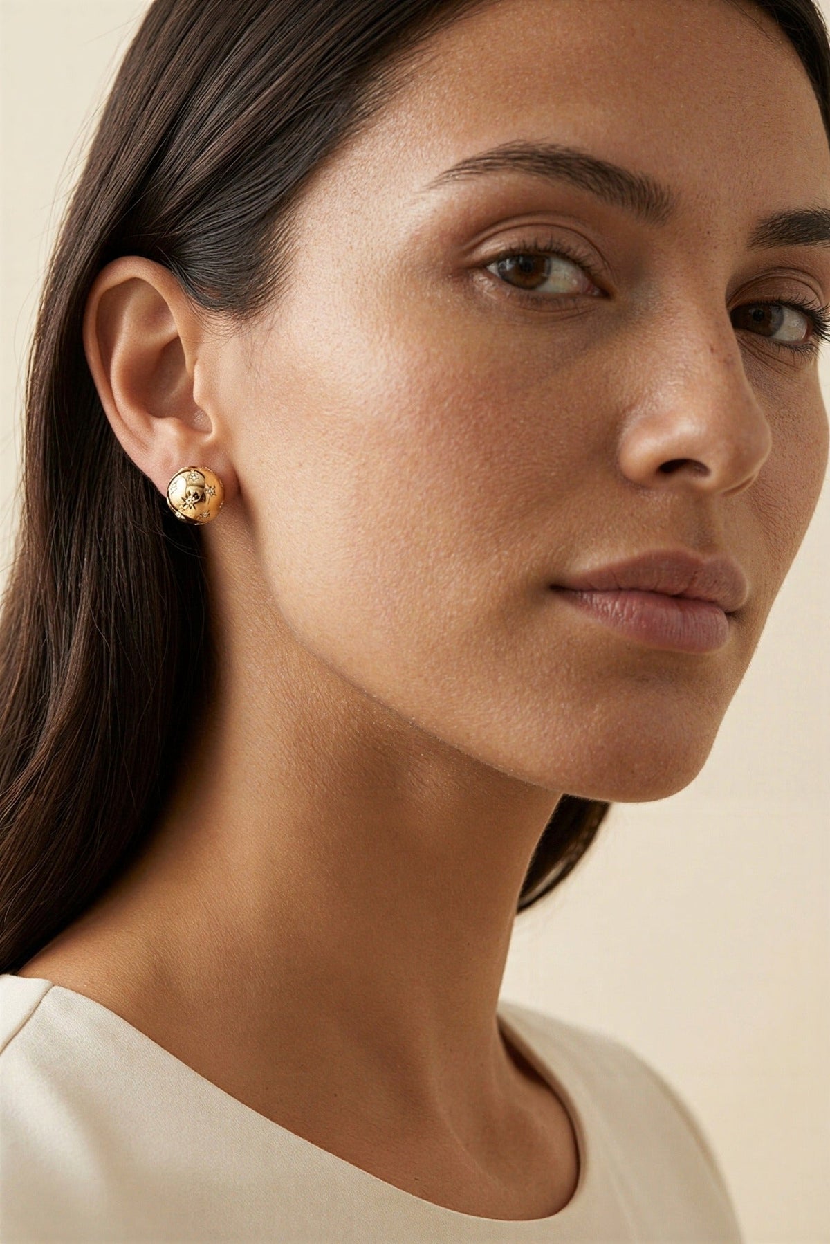 Estela Waterproof Star Dome Stud Earring worn by model – Akalia waterproof jewelry