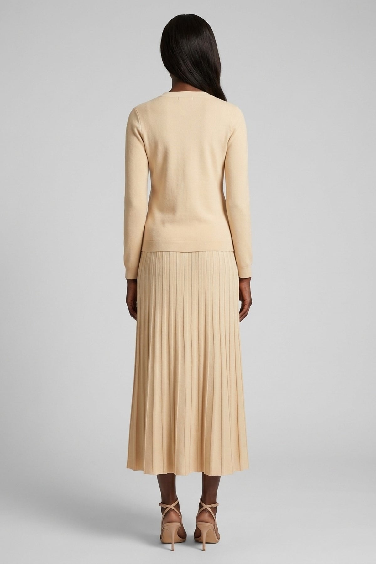 Henriette Knit Peplum Cardigan and Pleated Skirt Set back view - Akalia