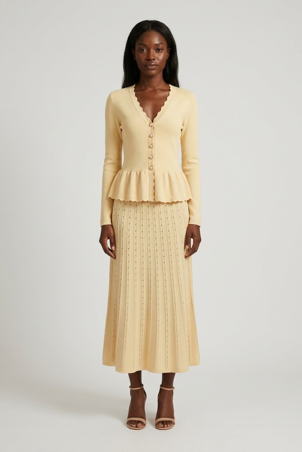 Henriette Knit Peplum Cardigan and Pleated Skirt Set front view - Akalia