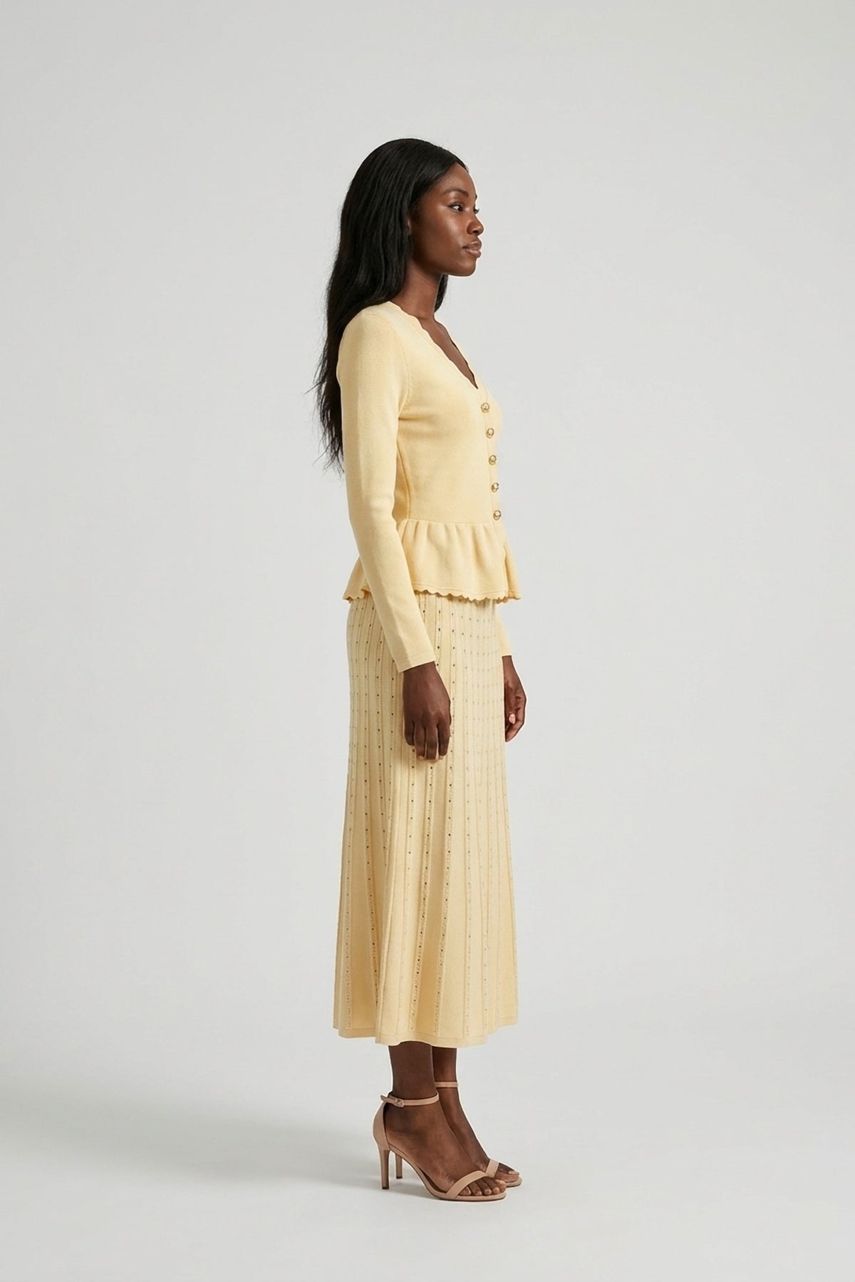 Henriette Knit Peplum Cardigan and Pleated Skirt Set side view - Akalia