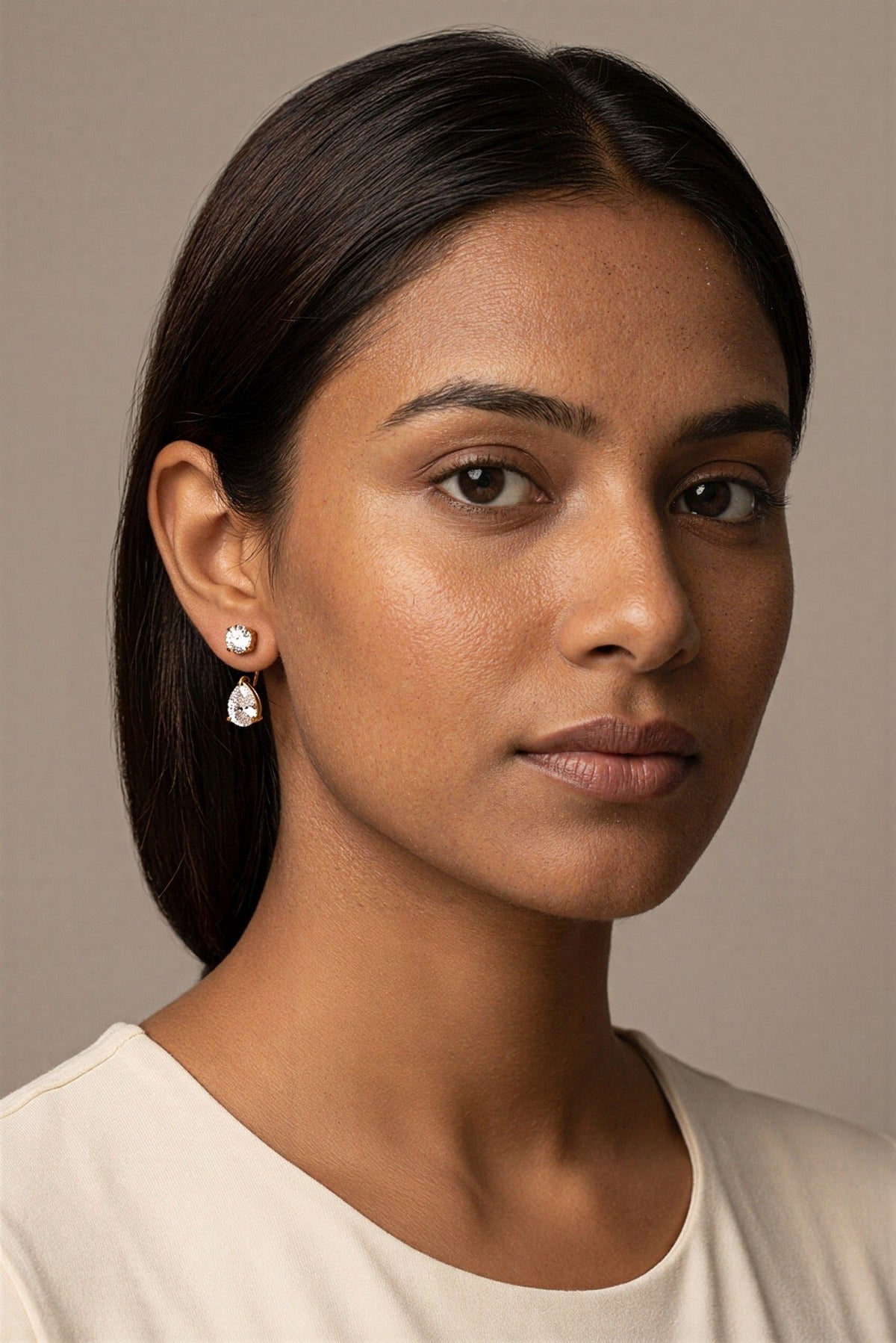 Noor Waterproof Round & Pear CZ Drop Earring worn by model – Akalia waterproof jewelry