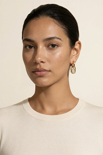 Thea Waterproof Pavé CZ Layered Huggie Earring worn by model – Akalia waterproof jewelry
